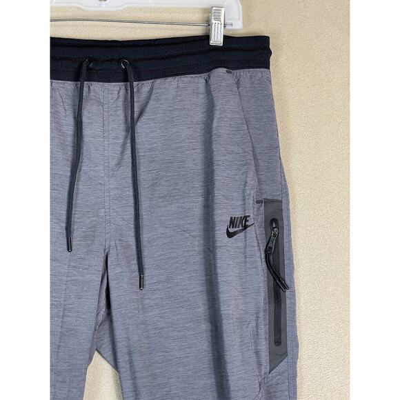 Nike Pants Womens Medium Gray Bonded Woven Tech Tapered Lightweight Jogger - Picture 3 of 12